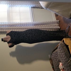 Long black sleeveless summer dress.